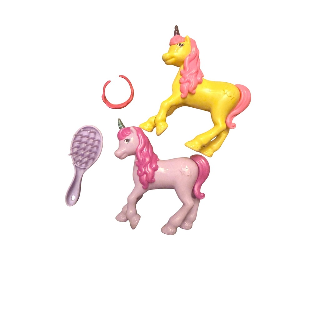 2 unicorn figures from Barbie Dreamtopia toy line